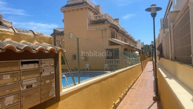 Foto a4546b3b-c593-419d-81c6-742a77fc257d. Casa adossada amb aparcament piscina a El Edén Guardamar del Segura