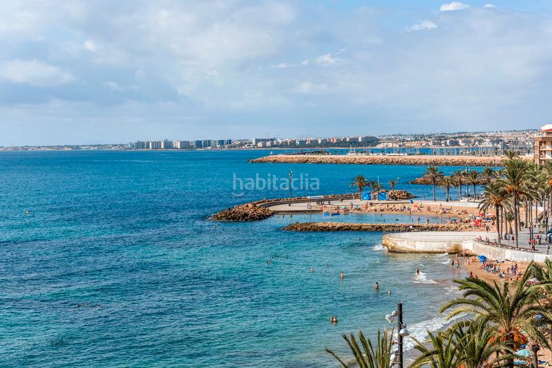Foto 02d952ea-9f5d-48b7-985a-6691469019bc. Apartamento descubra este grannbspapartamento en primera línea de playa, situado en la codiciada playa del cura , una de las zona en Torrevieja