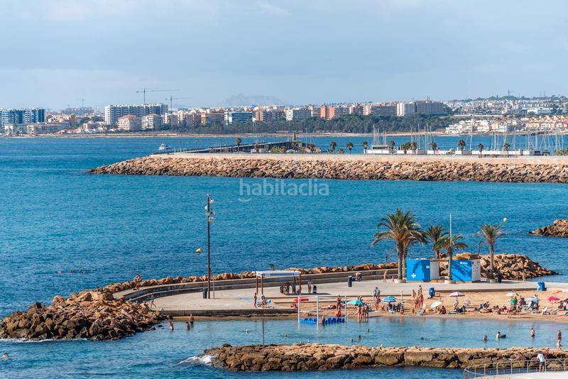 Foto 854bec42-e1d6-4c4b-bb58-fc5501af6805. Apartamento descubra este grannbspapartamento en primera línea de playa, situado en la codiciada playa del cura , una de las zona en Torrevieja