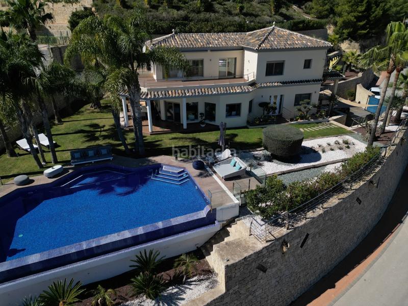 Foto 2b22da76-c7ee-462b-9e24-bc14b0139284. Maison avec parking piscine dans Cala Advocat-Baladrar Benissa