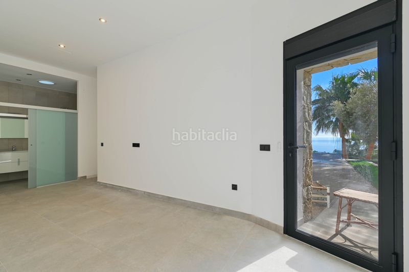 Foto f9b5abdd-3e13-4406-ace8-48a9cf20ef99. Casa amb aparcament piscina a La Fustera Benissa