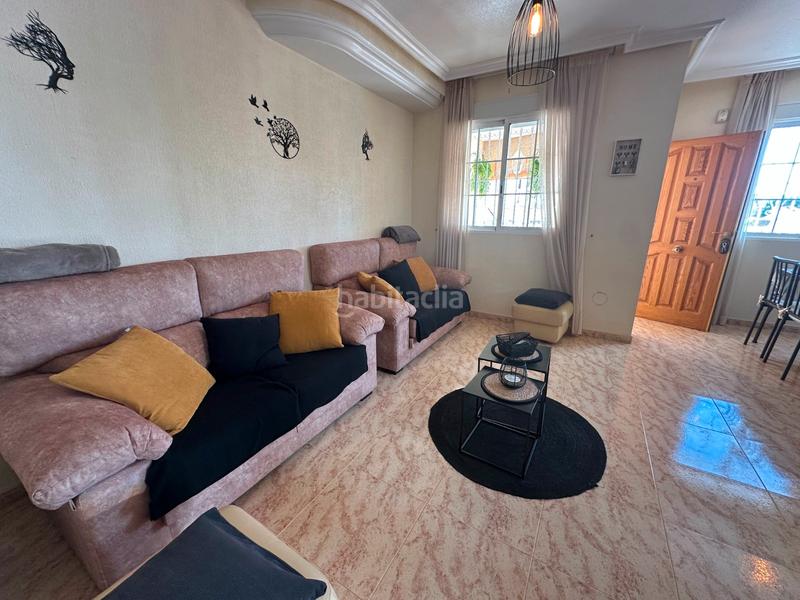 Foto 0d2bda27-593e-4f65-8442-e62f265f5080. Semi detached house with parking pool in Villamartín-Las Filipinas Orihuela