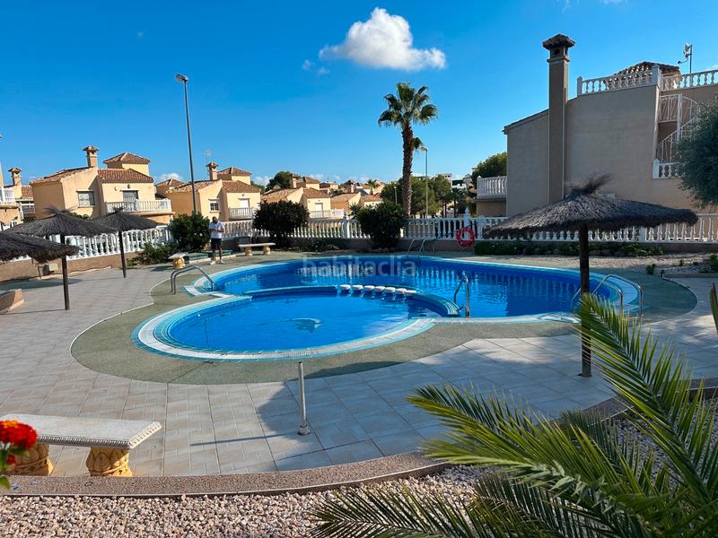 Foto 672805f1-5a18-4f62-87f5-c6281bce4351. Semi detached house with parking pool in Villamartín-Las Filipinas Orihuela
