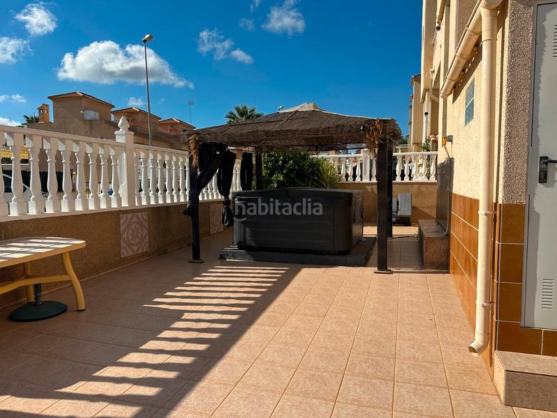 Foto 6d8699fb-facd-4899-b395-40a33cae6613. Semi detached house with parking pool in Villamartín-Las Filipinas Orihuela
