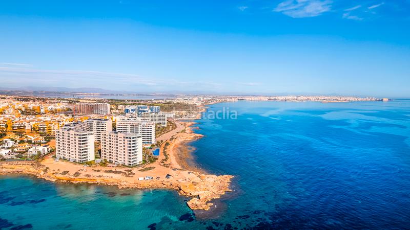 Foto 2b954573-0753-4aff-aaa6-41ffa3f0018f. Apartament amb aparcament piscina a Punta Prima Orihuela