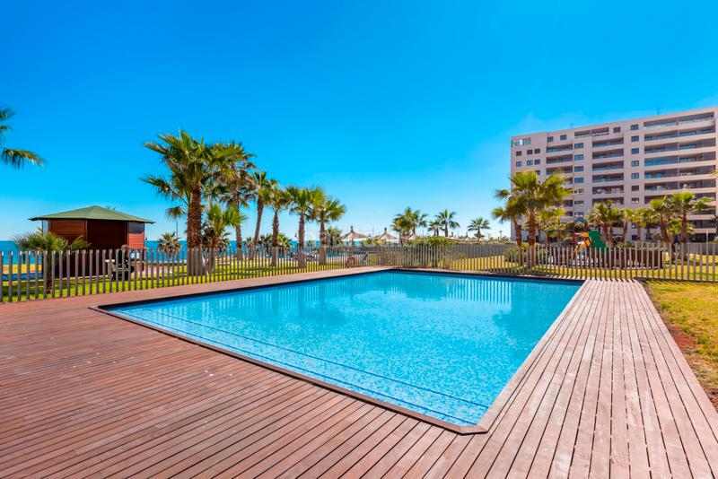 Foto 4e2d659b-155b-4466-b066-ad16c7e9c0fe. Apartament amb aparcament piscina a Punta Prima Orihuela