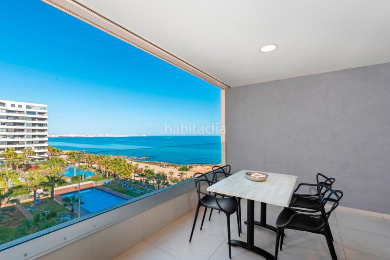 Foto 58a8e3fc-30e1-4c17-98d6-b0ad3b6eadd1. Apartament amb aparcament piscina a Punta Prima Orihuela