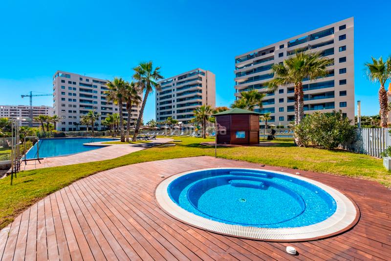 Foto 7505d28b-2083-4f97-becd-321e65c490dc. Apartament amb aparcament piscina a Punta Prima Orihuela