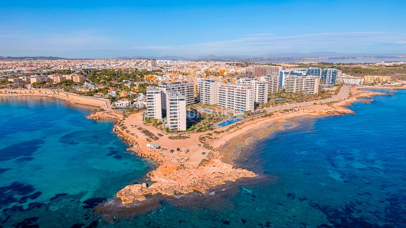 Foto 89c3795a-d643-4cc9-9c24-29361cbe2bee. Apartament amb aparcament piscina a Punta Prima Orihuela