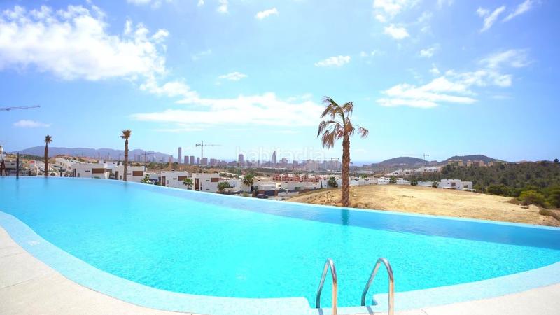Foto 270f2271-b2b6-4d2c-ac7c-42533c50be15. Duplex with parking pool in Golf Bahía Finestrat