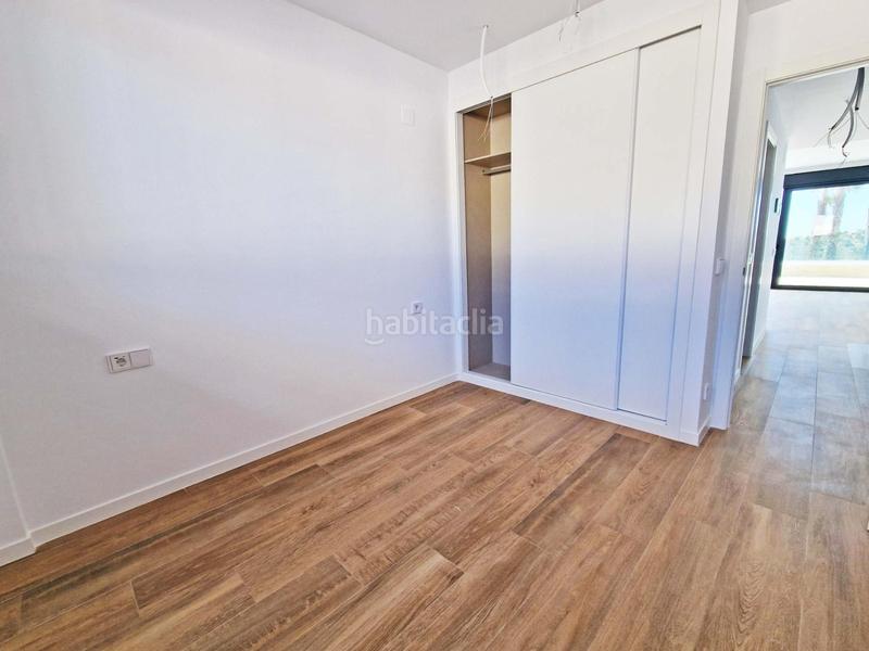 Foto ac46a9fd-410d-4660-a1e8-053ba7d9793e. Duplex with parking pool in Golf Bahía Finestrat