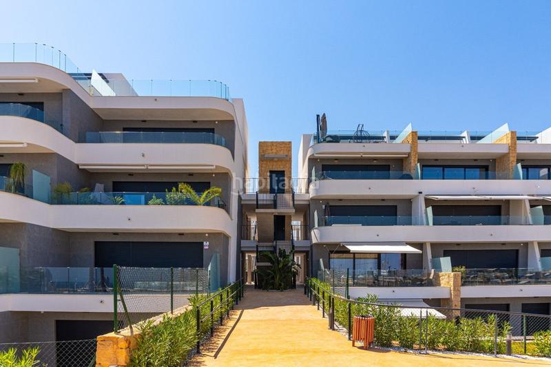 Foto 7c42d456-1aec-458d-a65c-4a7f72e14654. Duplex with parking pool in Golf Bahía Finestrat