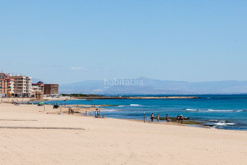 Foto f9d0cd0d-f1d3-42bd-a44b-340167fcd515. Casa amb aparcament a Los Europeos Torrevieja