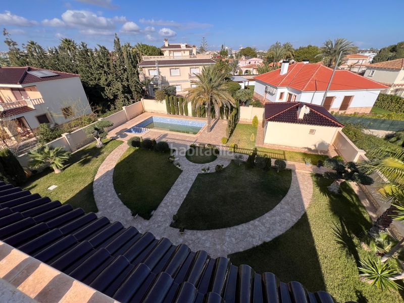 Foto 305d1dcd-d07b-44d4-bb54-fa605086d32e. Casa amb calefacció aparcament piscina a Cabo Roig Orihuela