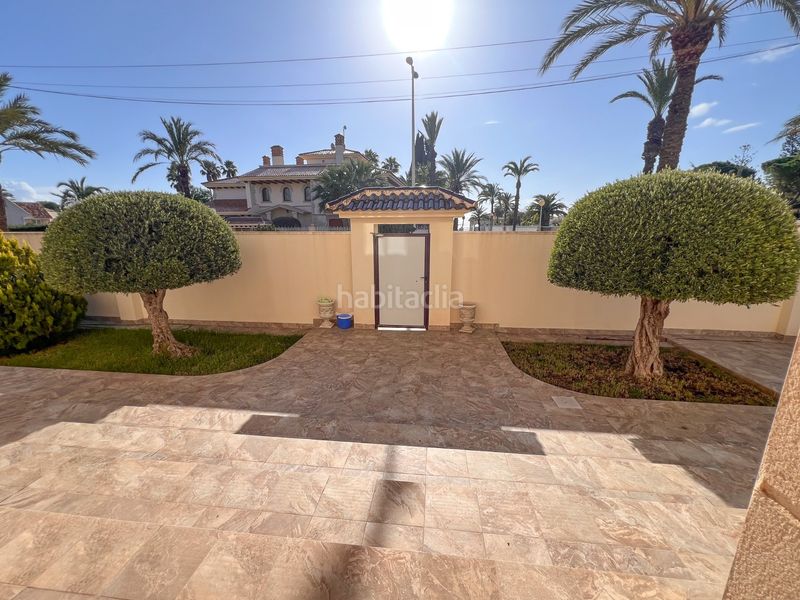 Foto feb5b469-6e59-413f-9297-22aae4f470e6. Casa amb calefacció aparcament piscina a Cabo Roig Orihuela