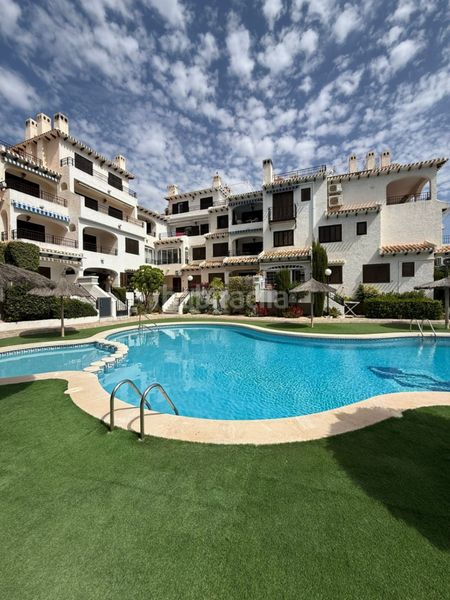 Foto d806cfd4-8dd7-47d9-b6c2-1fba4806e405. Appartement mit parking pool in Aguamarina Orihuela