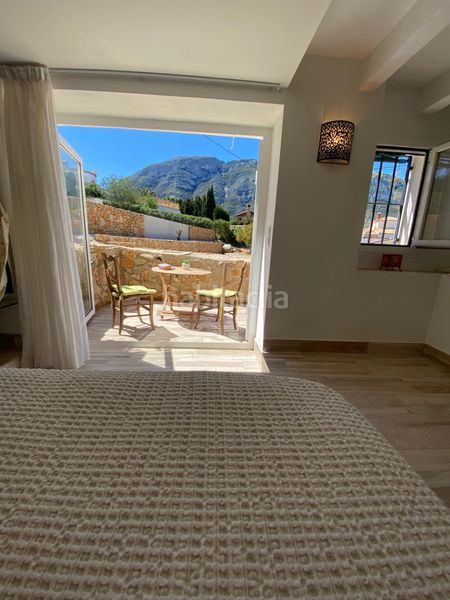 Foto a25a21b9-85c6-4c8d-b786-52334b9fa2ed. Casa amb aparcament piscina a El Montgó Dénia