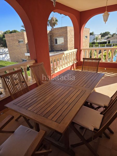 Foto 1a416eff-2687-4e44-8bbd-2fdcf5caae62. Casa amb aparcament piscina a Campoamor Orihuela