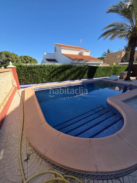 Foto 69dc47f3-a814-4f73-b7ce-53a1f1251a51. Casa amb aparcament piscina a Campoamor Orihuela