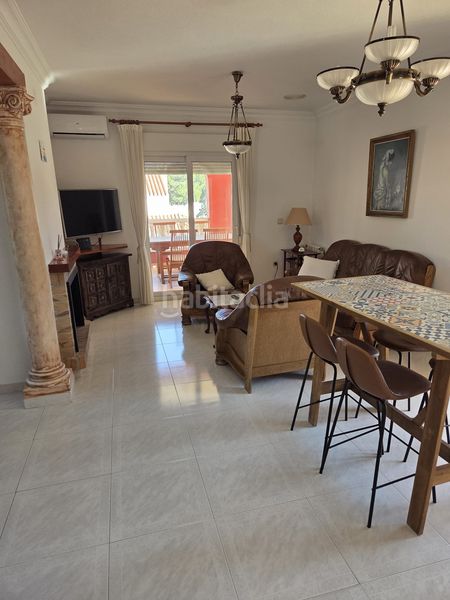 Foto c113f505-994a-4527-b5d5-74cf40311077. Casa amb aparcament piscina a Campoamor Orihuela