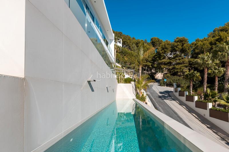 Foto fc843af0-4d12-4c7a-ab7d-3f19e6cf9f5e. Casa villanbspde moderno diseño en su máxima expresión.situada en la urbanización mar azul a tan solo 300 metros de la cala portitxol, en Xàbia