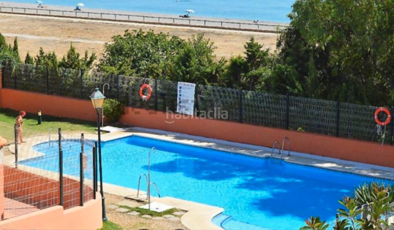 Foto 69bb6715-c6fb-45fc-89d8-3a2d67978d44. Piso  a pocos pasos del mar – la duquesa alta, ?? acceso directo a la playa | piscina | jardines | garaje privado en Manilva