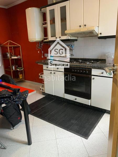 Foto 26b25d9e-b8fd-4c90-b0ea-d17fadb96884. Semi detached house with heating parking in As Lagoas Ourense