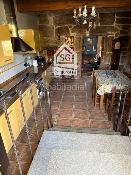Foto d7cb6086-c7d3-4473-b1cc-0d9436b64a78. Casa adosada chalet espectacular con licencia vacacional en Ourense