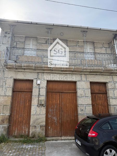 Foto 4cffb405-1859-478a-82c9-b8496a8ce744. Casa adossada a Cenlle
