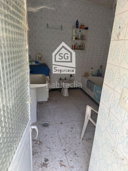 Foto 56d6823a-373e-4364-8a9f-8ebc75cdf61e. Casa adossada a Cenlle
