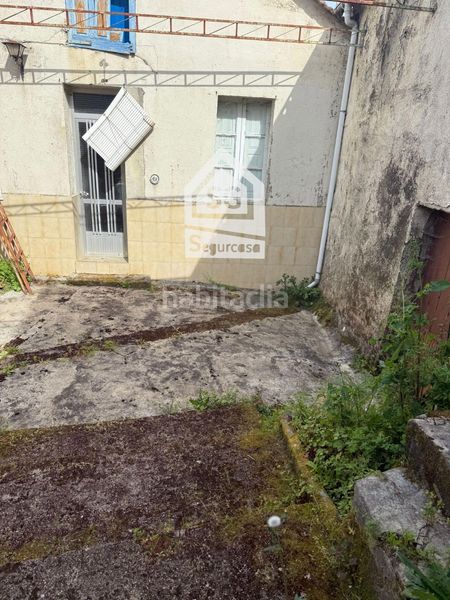 Foto 701c8dc4-baf9-4119-8054-79c4fc8c62ac. Casa adossada a Cenlle