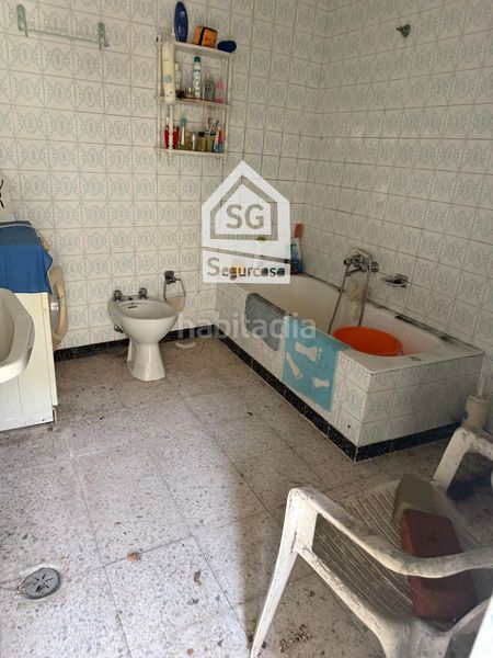 Foto cc9bdd85-29a3-459d-bac0-971d9634c450. Casa adossada a Cenlle