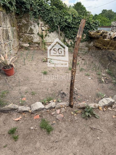 Foto 87f70fc4-c719-4f56-bb45-52f1a5d6d7df. Casa adossada a Amoeiro