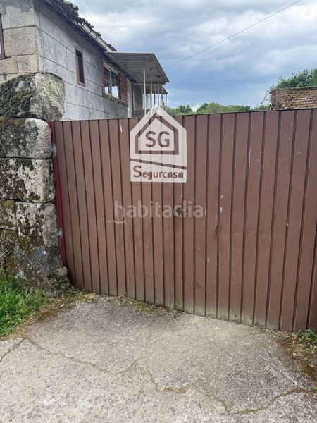 Foto eae49589-a605-4f41-9c30-a16ecce7aeb0. Casa adossada a Amoeiro