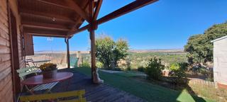 Haus  Calle colinas. Cabaña de madera con preciosas vistas