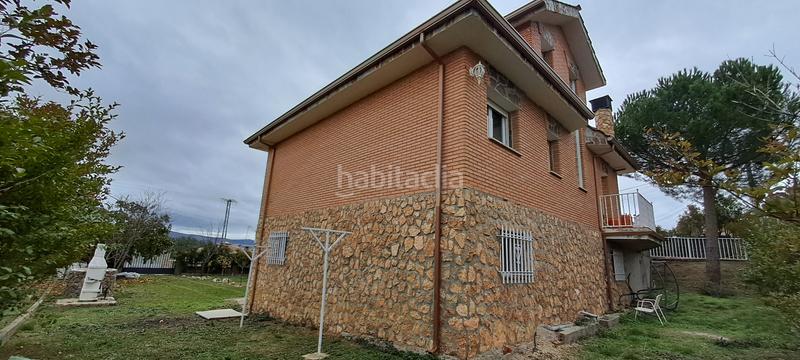 Foto bccb752f-1849-4000-9a35-c7a93eb2c873. Chalet with fireplace parking in Ituero y Lama