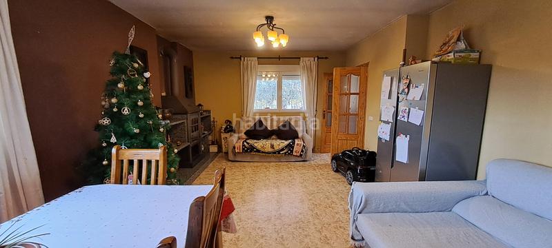 Foto dde1e3f3-2cb2-4b4b-a699-dec5a28d7f79. Chalet with fireplace parking in Ituero y Lama