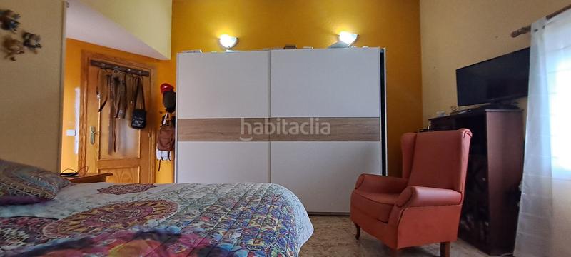 Foto f0b80e21-5da2-405b-b478-ba1a2d67958b. Chalet with fireplace parking in Ituero y Lama