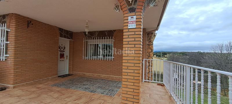 Foto f9f32733-0a05-4440-980c-0895f61d456c. Chalet with fireplace parking in Ituero y Lama