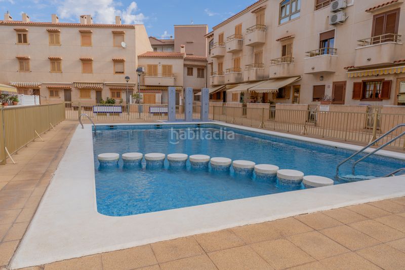 Foto 6939fe6f-788b-4abc-9cde-2effab6f7770. Casa adossada amb aparcament piscina a Los Arenales del Sol Elche / Elx