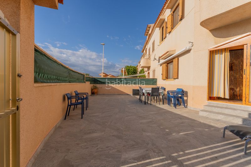 Foto 86601de5-9516-4fc4-a117-7f7b75a60d12. Casa adossada amb aparcament piscina a Los Arenales del Sol Elche / Elx