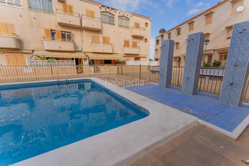 Foto e261e581-1dab-4cfd-adfe-a2734b5e8d02. Casa adossada amb aparcament piscina a Los Arenales del Sol Elche / Elx