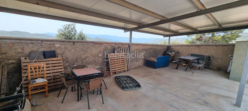 Foto d56ba7cd-3b9d-4e59-b13f-9de9728ddb41. Chalet con camino in Bugarra