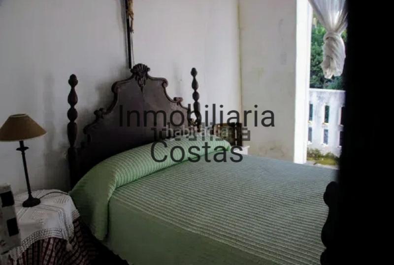 Foto ce8bfbc6-1d42-4022-8fde-3fd64f6569ea. Casa amb calefacció aparcament a Bueu