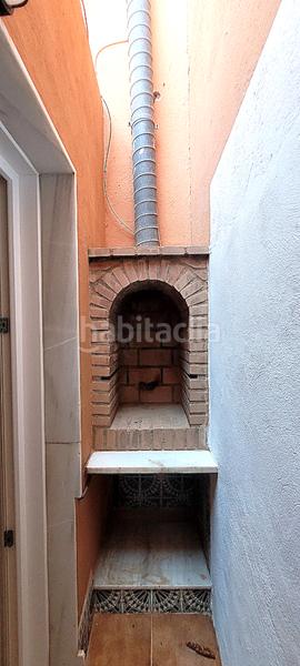 Foto 0aa2e855-4fa6-4123-a23e-544b5111f8a4. Casa adossada amb xemeneia calefacció aparcament a Roquetas de Mar