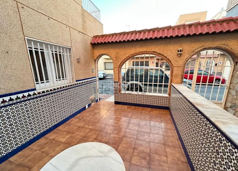 Foto 3e86f80f-f222-43c7-a566-434c19dc86ba. Casa adossada amb xemeneia calefacció aparcament a Roquetas de Mar