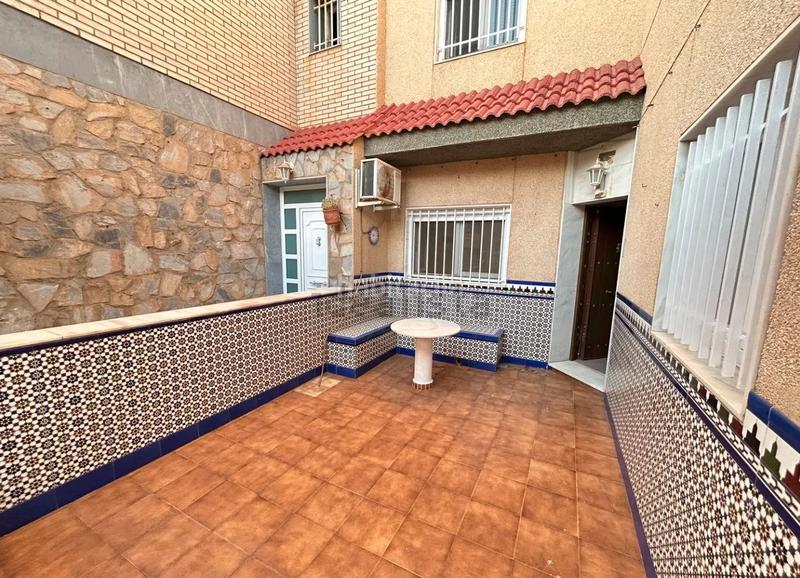 Foto fec9f4c1-fc4b-469a-b6b2-ab6e17d67c69. Casa adossada amb xemeneia calefacció aparcament a Roquetas de Mar