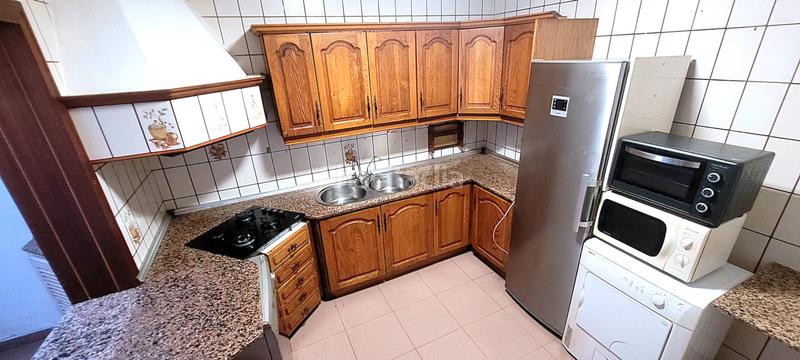 Foto 23f29476-3c4b-464b-adfd-9237307f1120. Casa a schiera con camino riscaldamento in Roquetas pueblo Roquetas de Mar