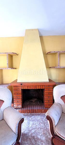 Foto b717d2d7-4489-42d0-8cc6-67f1b05a4273. Casa a schiera con camino riscaldamento in Roquetas pueblo Roquetas de Mar