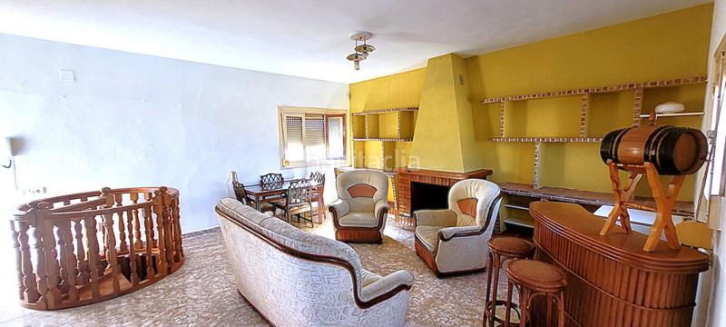 Foto de6488bd-a54c-429e-9767-1da059d8a4e8. Casa a schiera con camino riscaldamento in Roquetas pueblo Roquetas de Mar